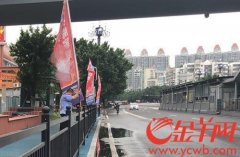 广告彩旗不是想挂就挂 广州有商家乱拉挂被整改